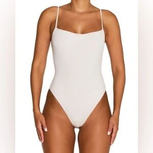 NAKED WARDROBE White Cami Bodysuit. NWT. Size Medium.